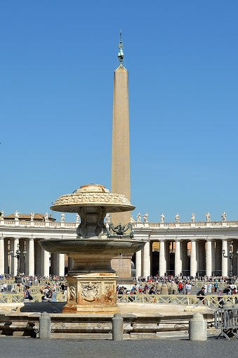 Rome, Lazio;  Italy - September 17, 2019: Saint Peters square with the ancient Egyptian obelisk and Fontana del Bernini in the Vatican city of Rome - Italy.