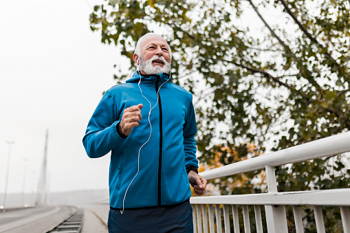 Mature man running