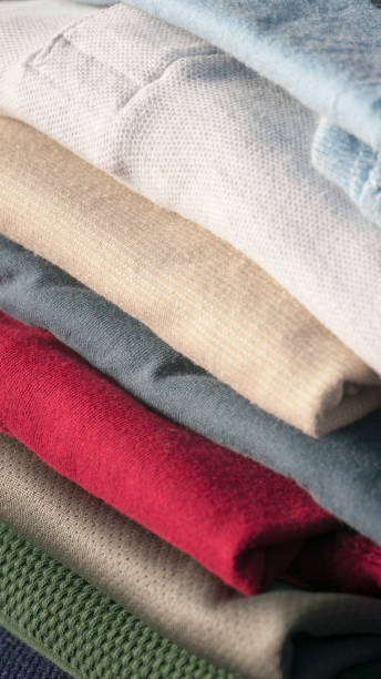 istock Pile of folded  shirts 1447159363