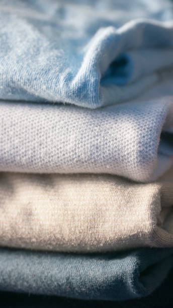 istock Pile of folded cotton shirts 1447159427