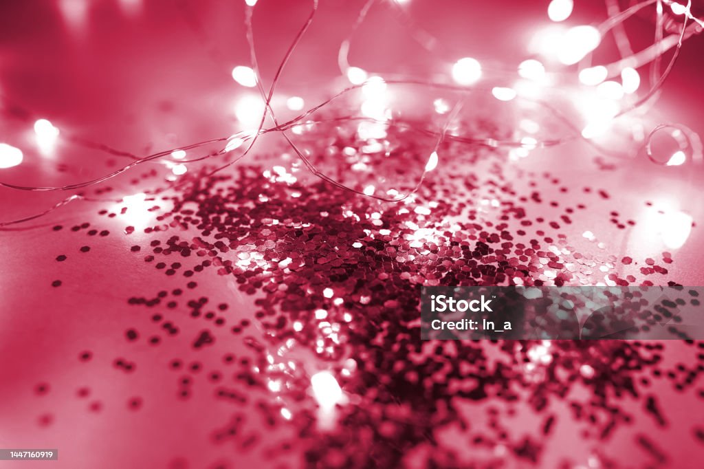 Christmas purpur or viva magenta color ball on monochrome background. Trending color of 2023 year. 2023 Stock Photo