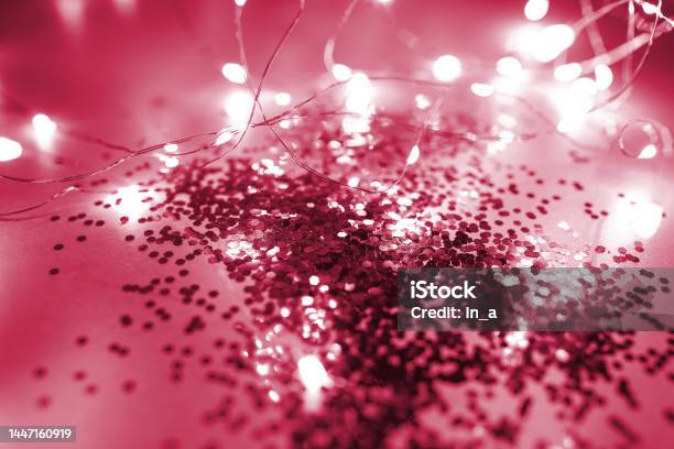 Christmas Purpur Or Viva Magenta Color Ball On Monochrome Background Trending Color Of 2023 Year Stock Photo - Download Image Now