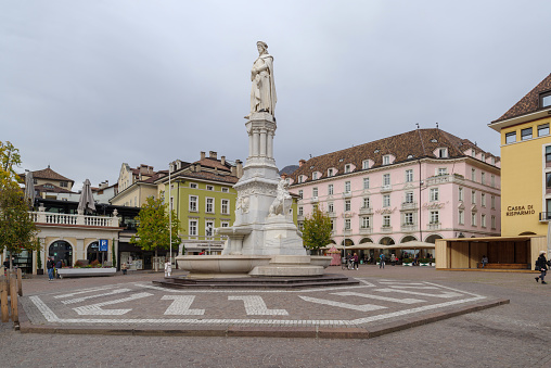 Bolzano, Italy - November 1, 2022: General view of the Walter square and the statue of Walter von der Vogelweide in Bolzano