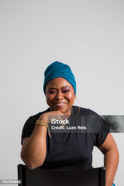 Powerful Black Woman Looking At The Camera And Smiling Stock Photo - Download Image Now