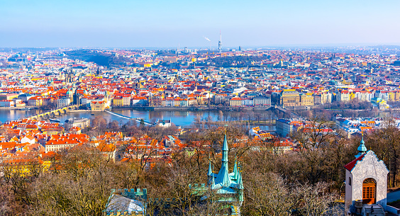 Prague cityscape from Petrin Hill with Vltava River and Zizkov Tower on background. Prague, Czech Republic