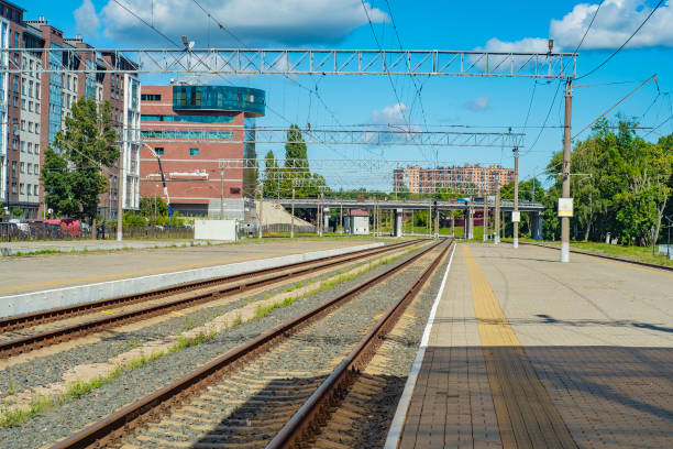 istock Low platform for trains at the station in a small town. Railway platform for boarding passengers at ground level. 1447168092