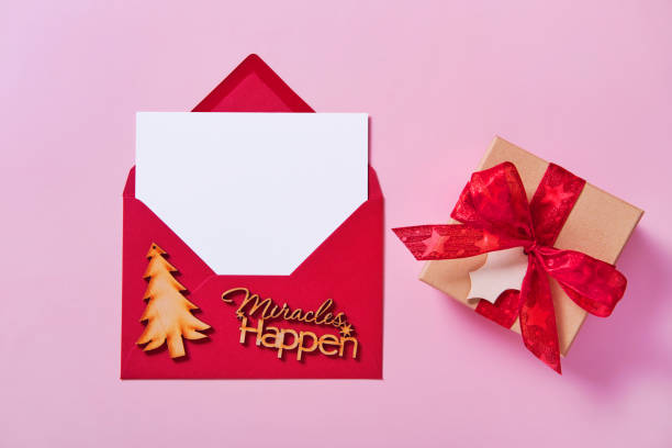 istock Template for Christmas postcard design with inscription Miracles happen. 1447169406