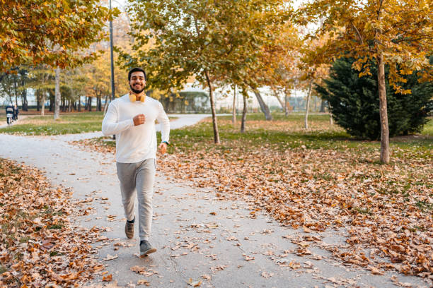 istock Young Man Running In The Public Park 1447175571