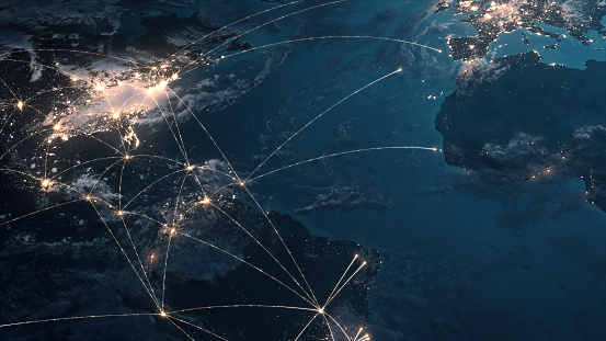 Expansión de las líneas de conexión global por la noche - Negocios globales, red financiera, rutas de vuelo photo