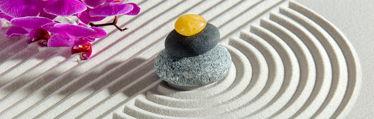 textured sand and stone in Japanese zen garden