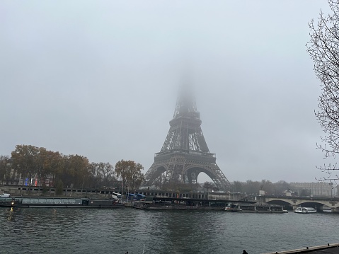 Eiffel Tower in the mist in winter