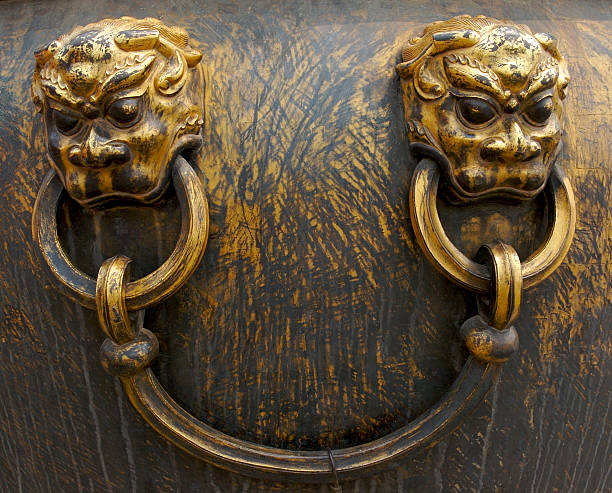 istock Chinese lions as handle bars on an urn 144718344