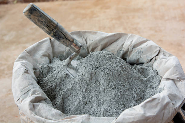 istock Cement powder and trowel put in bag package 1447183716