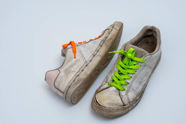 Old broken boot on white background for easy selection