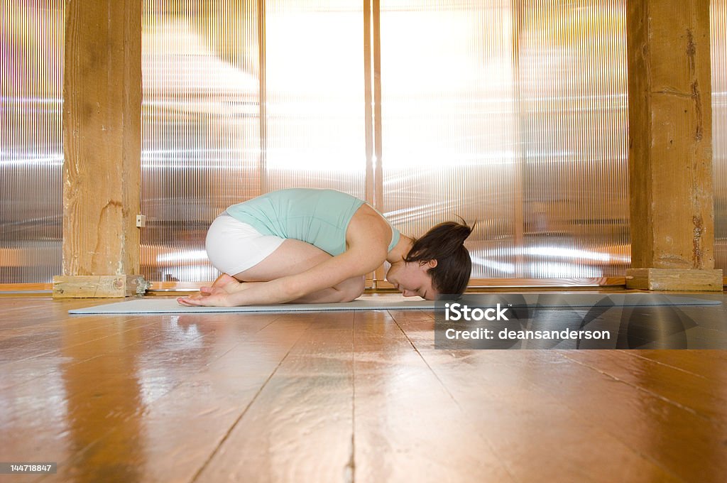 Yoga Stretch Female doing yoga Active Lifestyle Stock Photo