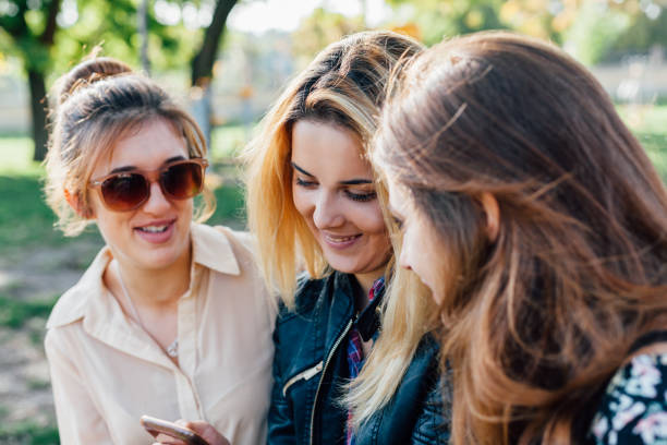 istock Three happy girls 1447189055