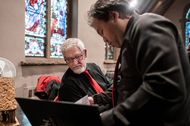 istock Male Church Choir members getting ready for  performance 1447189219