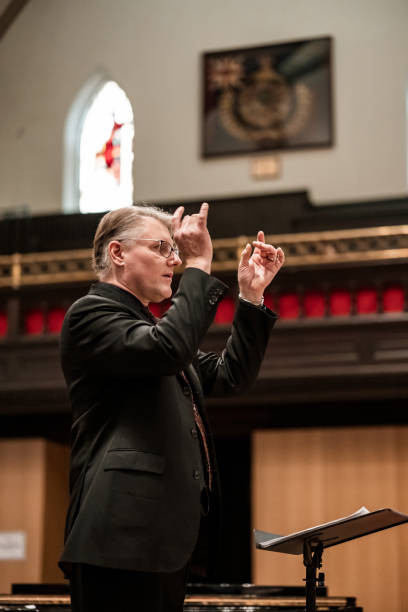 istock Church Choir Conductor during Concert performance 1447189410