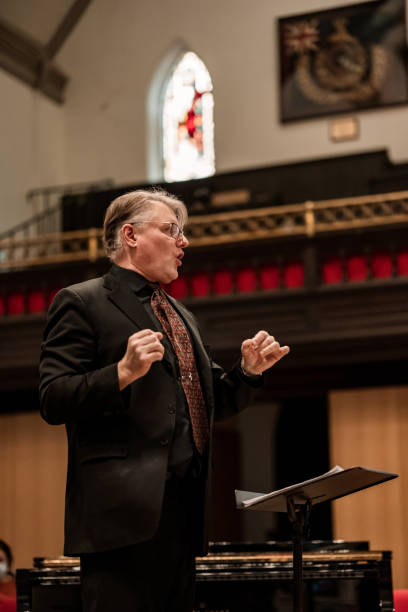 istock Church Choir Conductor during Concert performance 1447189416