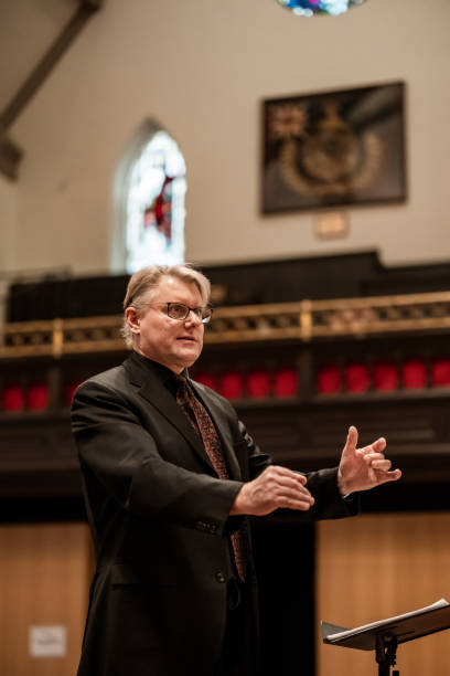 istock Church Choir Conductor during Concert performance 1447190097