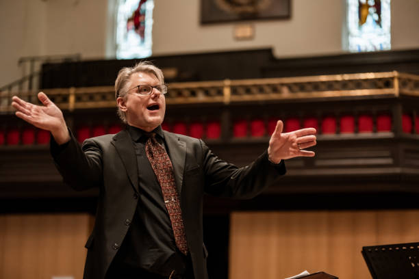 istock Church Choir Conductor during Concert performance 1447190127