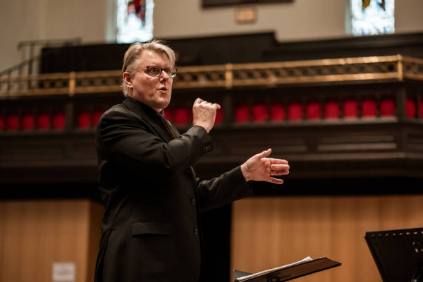 istock Church Choir Conductor during Concert performance 1447190130