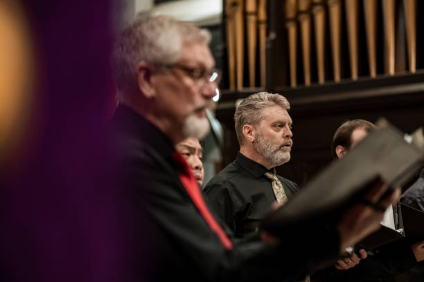 istock Men singers in Church Choir during performance at Concert 1447190190