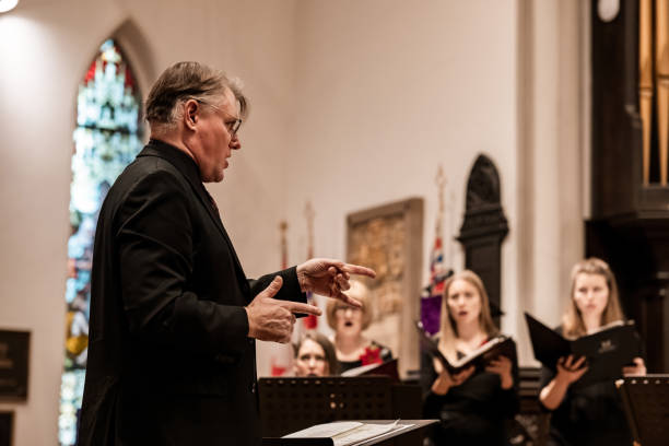istock Church Choir Conductor during Concert performance 1447190256
