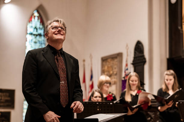 istock Church Choir Conductor during Concert performance 1447190278