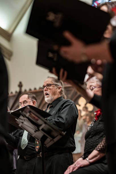 istock Men singers in Church Choir during performance at Concert 1447190385