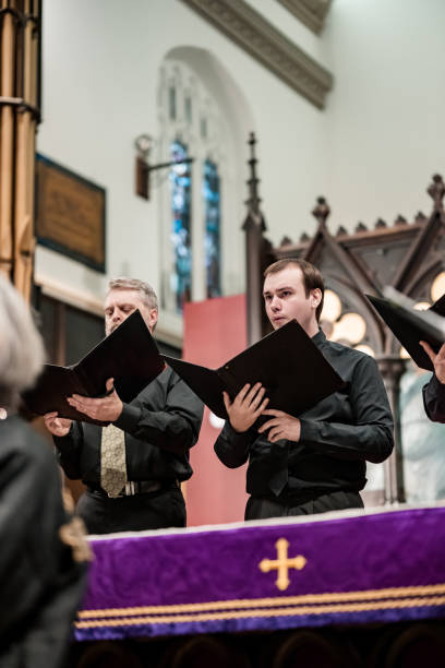 istock Men singers in Church Choir during performance at Concert 1447190417