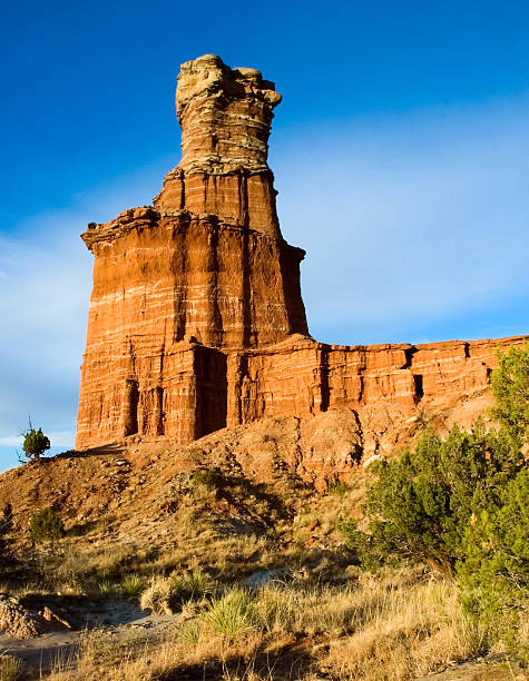 Lighthouse Rock in Palo Duro Canyon at sunset.