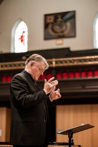 istock Church Choir Conductor during Concert performance 1447191810