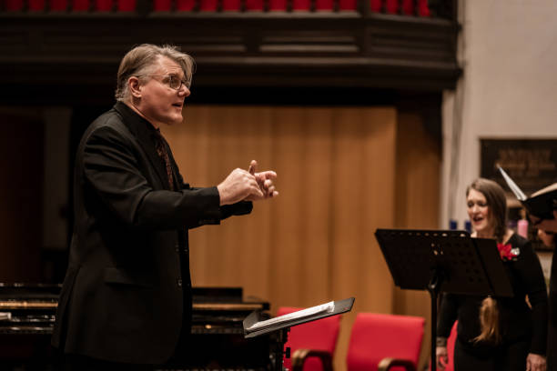 istock Church Choir Conductor during Concert performance 1447191826