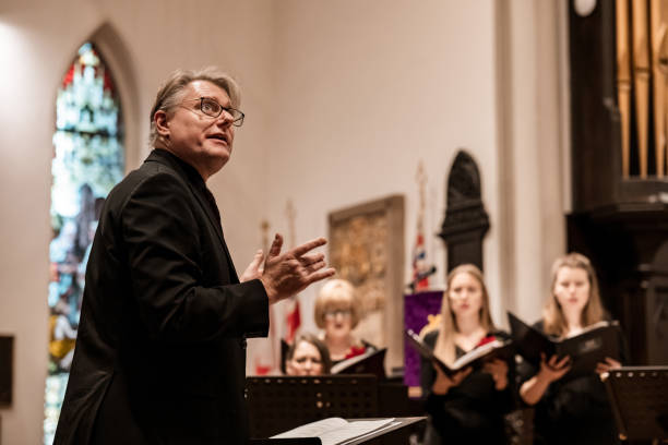istock Church Choir Conductor during Concert performance 1447191933