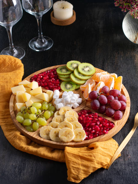 istock Appetizers boards with assorted sweets and fruits . Dessert Charcuterie board. , copy space. Vertical 1447198721