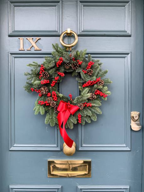 istock Christmas wreath on a blue grey door 1447200675