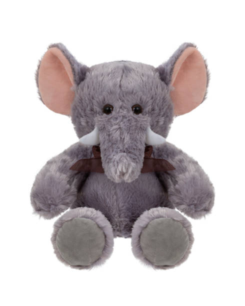 istock Stuffed gray elephant sitting on white background 1447205873