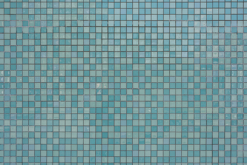 texture of a turquoise tilded exterior wall