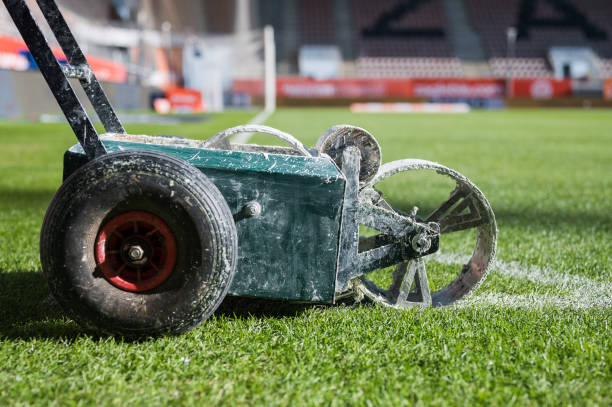 istock Line painting trolley on a soccer field 1447208914