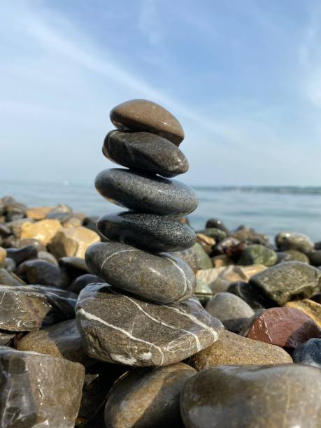istock Stacked stones on the beach. 1447210433