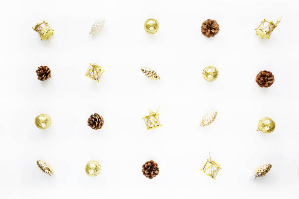 istock Christmas composition. Christmas presents, pine cones, gold ornaments on white background. 1447212142