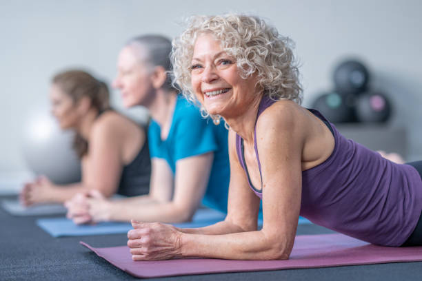 istock Women in a Yoga Class 1447212855