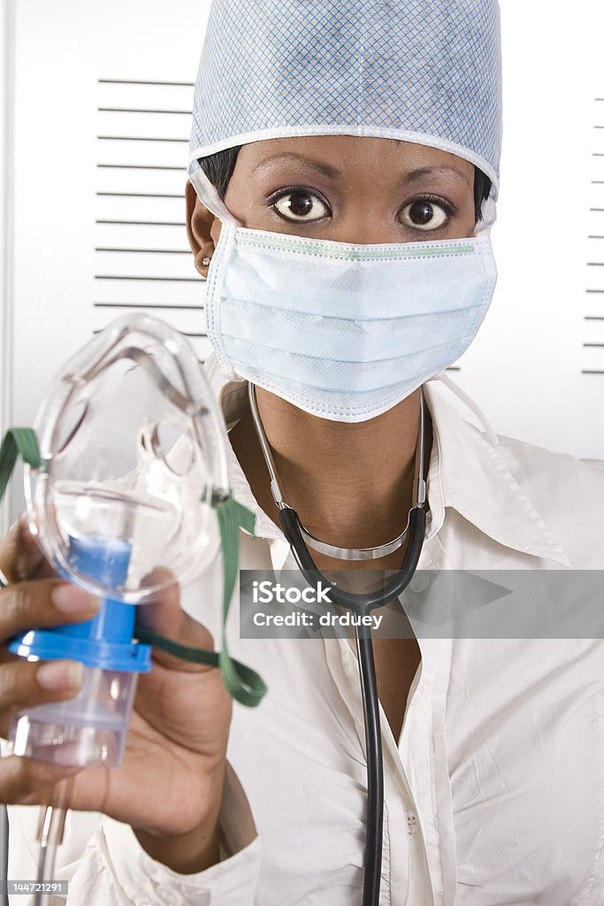 Africano femmina medico - Foto stock royalty-free di Accudire