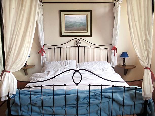 カーテンベッド - pillow bedroom bed rural scene ストックフォトと画像