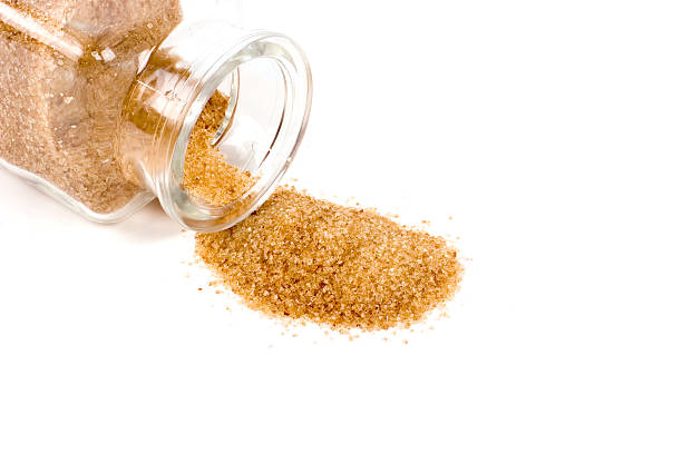 istock Brown sugar in bottle isolated on white 144721597