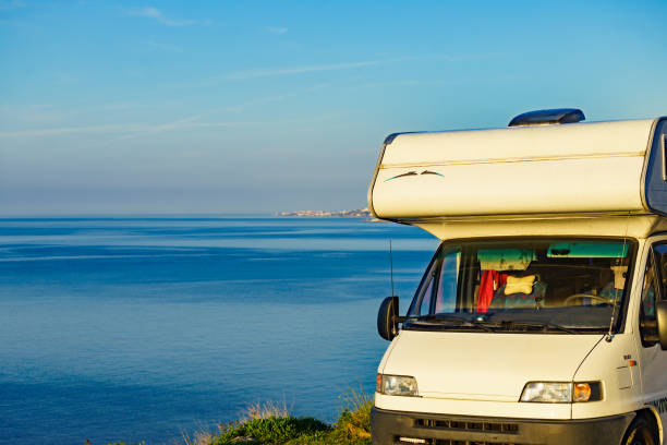 istock Rv caravan camping on sea shore 1447218316