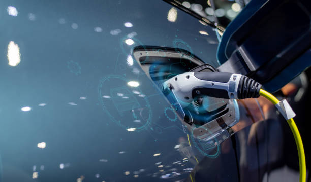 istock Modern technology UI control information display, car fueling station connected power cable, plug-in charging power for electric vehicles, and alternative sustainable eco energy 1447219795