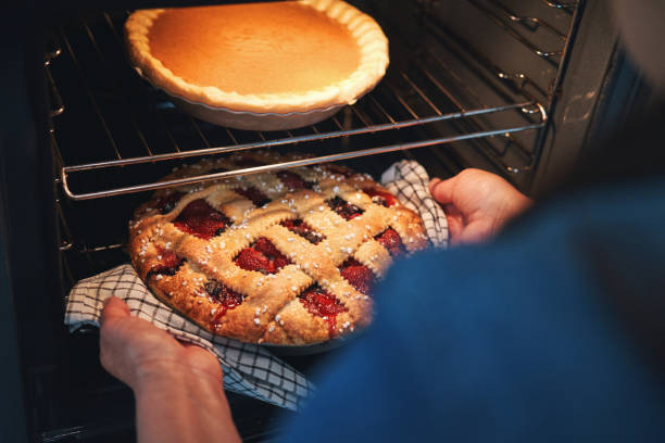 istock Preparing Berry Pie in Domestic Kitchen 1447220150