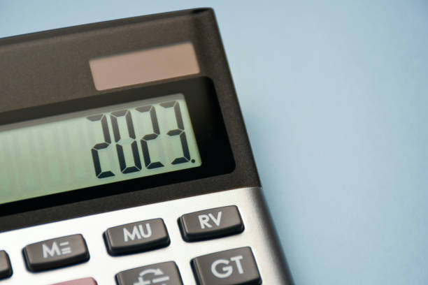 istock 2023 on the calculator screen. New year 2023 on the calculator display with copy space 1447221012